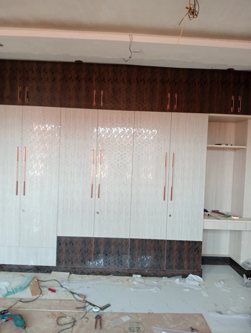 Fareid Interiors and Carpenter Service for Modular Kitchen Sofa Bed Almirah and Other Furniture Work project