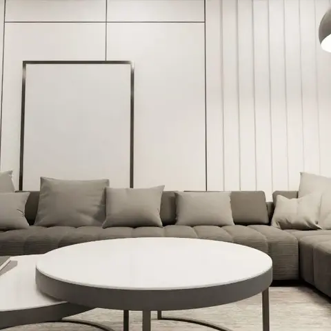 3D render of a minimalist living room with a deep grey modular sectional sofa, nesting round coffee tables