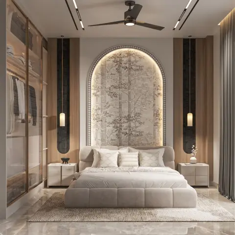 A backlit arched tree mural frames a channel-tufted bed flanked by cylindrical pendant lights, beside an open walk-in wardrobe in a marble-floored bedroom.