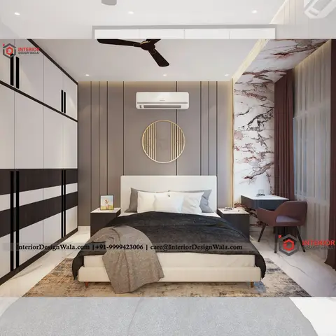 A bedroom with a striped black-and-white wardrobe, a fluted grey headboard wall with a circular gold wire wall accent, a pink-veined marble side wall