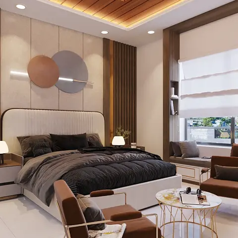 A bedroom with a wood-panelled headboard wall featuring circular disc wall art, brown leather armchairs around a marble-top coffee table