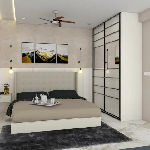 A cream diamond-tufted headboard with a shaped top sits against a pastel striped dado and mottled beige upper wall