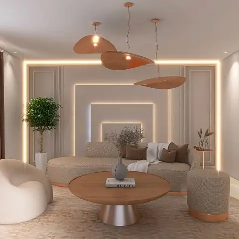 A curved beige sofa and round wood coffee table sit beneath three copper petal pendant lights, framed by nested LED-lit square wall mouldings.