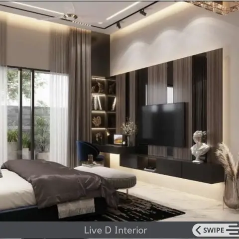 A dark fluted panelling wall holds a backlit display niche and wall-mounted TV beside sheer curtains onto a balcony, with a wall-mounted marble bust as decor.