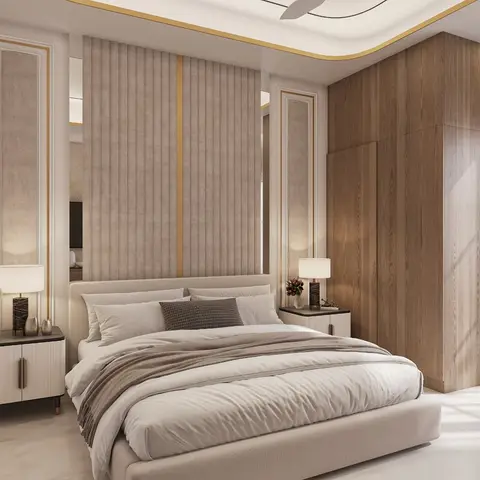 A fluted upholstered headboard wall with a gold inlay strip faces a full-height wood-veneer wardrobe, under a gold-trimmed curved cove ceiling.