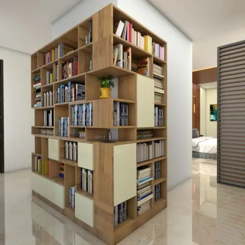 A freestanding corner bookshelf unit with irregular open cubbies and pastel cabinet fronts