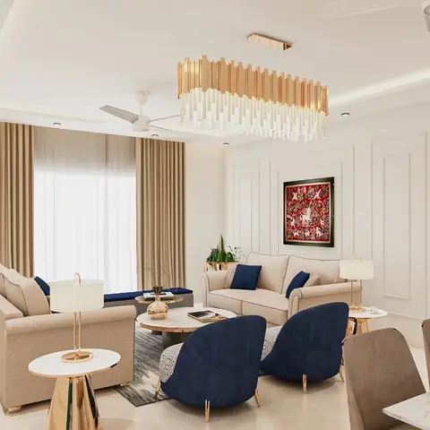A large living room with beige sofas and navy velvet accent chairs around a marble coffee table