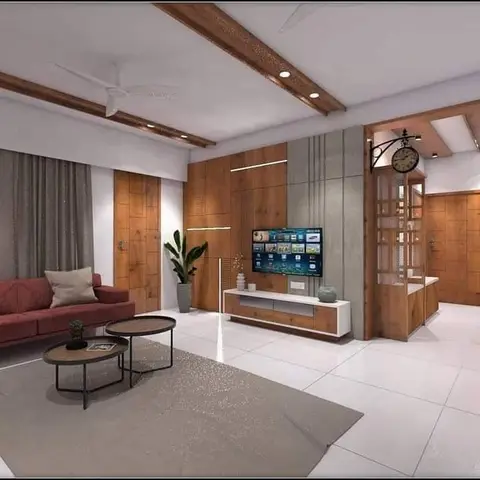 A living room with a wood-and-stone panelled TV wall, a floating white TV console, ceiling fans under a wood-beamed false ceiling