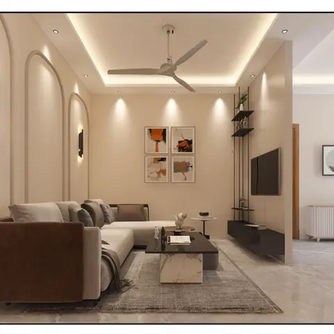 A living room with an L-shaped beige-and-brown sofa facing a floating black display shelf beside a wall-mounted TV, a four-panel abstract gallery wall