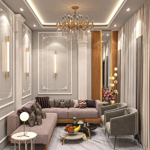 A living room with classical raised wall-moulding panels, a crystal-and-brass chandelier, a mauve sectional sofa with patterned cushions