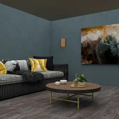 A living room with slate-blue walls, a black pinstripe sofa styled with mustard and graphic-print cushions, a round marble-top coffee table on brass legs