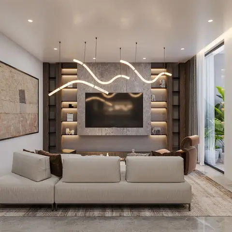 A low-slung beige modular sofa faces a marble-clad TV wall flanked by backlit open shelving