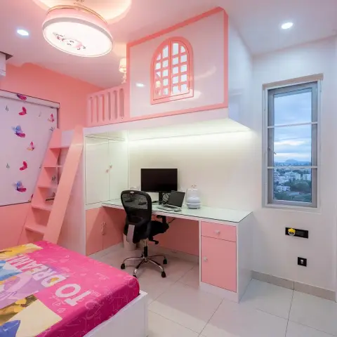 A pink girl's room with a raised play loft reached by a pink ladder, a mock arched window cut into the loft wall