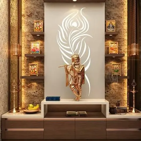 A pooja unit with a backlit Krishna silhouette panel, stone-textured side walls holding brass diyas and framed deity images