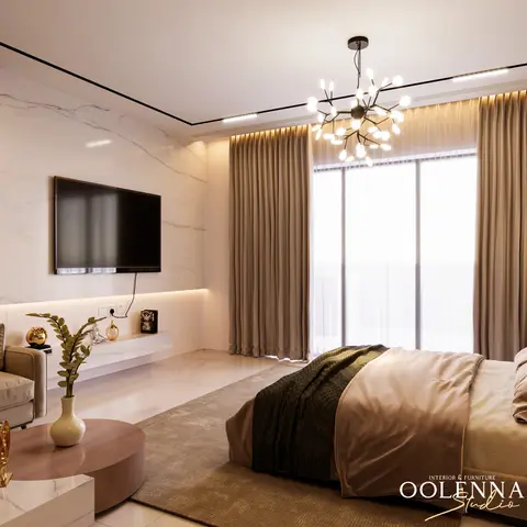 A primary bedroom with a marble TV feature wall, a sculptural branching LED chandelier