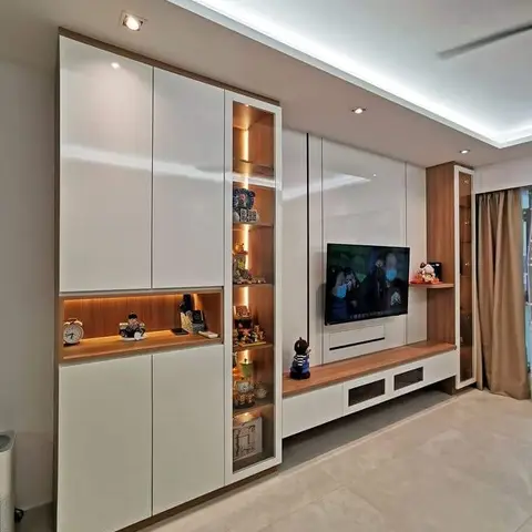 A real photo, living room TV feature wall combining a white gloss wardrobe unit with a backlit glass-shelf figurine display and a floating wood TV console.