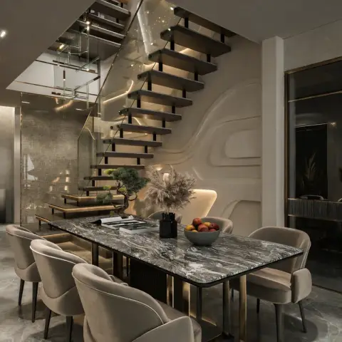 A render of a dining area with a dark marble-slab table, six beige velvet chairs, a floating staircase with bronze detailing