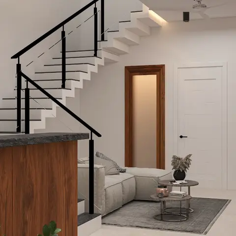 A render of an open-plan ground floor showing a walnut-clad kitchen island, a black-railed floating staircase