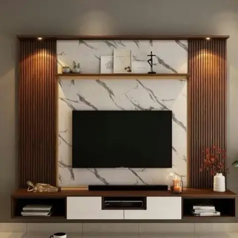 A TV console with fluted wood side columns framing a marble backdrop panel and a styled display ledge above a floating white-and-wood shutter unit