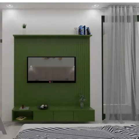 An olive-green fluted TV panel with a display ledge on top and a floating drawer console below, facing the striped foot of the bed across a white tiled floor.