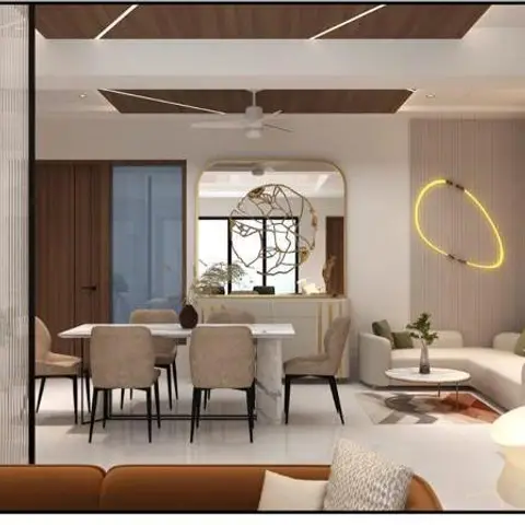 An open-plan dining and living space with a dark wood-strip cove-lit ceiling, an arched gold mirror console vignette, and a beige L-shaped sofa