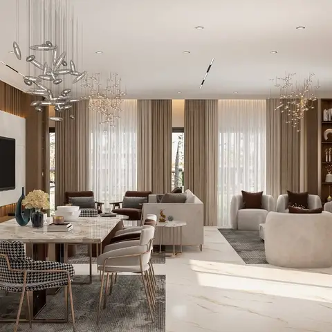 An open-plan hall with a marble-top dining table and houndstooth-pattern chairs beside a separate lounge seating area