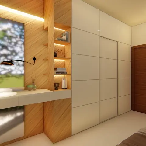 Bedroom dressing nook with a walnut panel wall, backlit open shelving, and a floating console beside a glossy white sliding wardrobe.