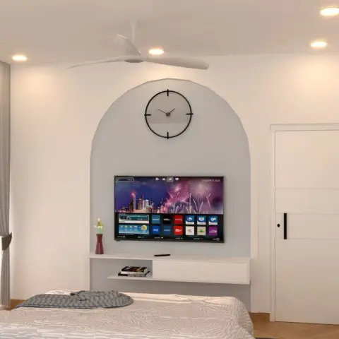 Bedroom render where the TV sits inside a shallow arched recess with a black-rimmed wall clock above it and a white floating console below