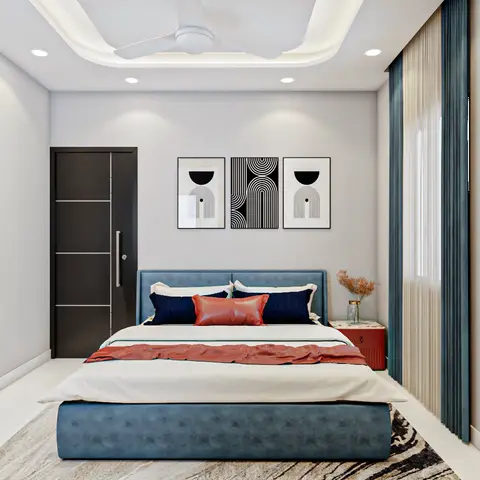 Bedroom render with a blue tufted upholstered bed, coral throw and cushions, and a black-and-white graphic art triptych above the headboard.