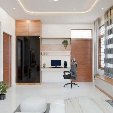 Bedroom seen across the foot of the bed to a built-in study ledge with a desktop and stepped wall boxes