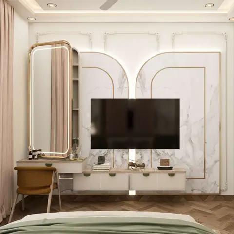 Bedroom TV feature wall with arched gold-inlaid marble panelling, a backlit freestanding oval mirror, and a herringbone timber floor.