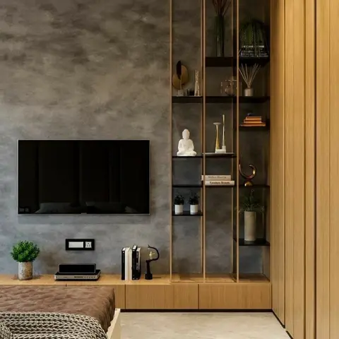 Bedroom TV wall with textured concrete-look plaster behind a wall-mounted television