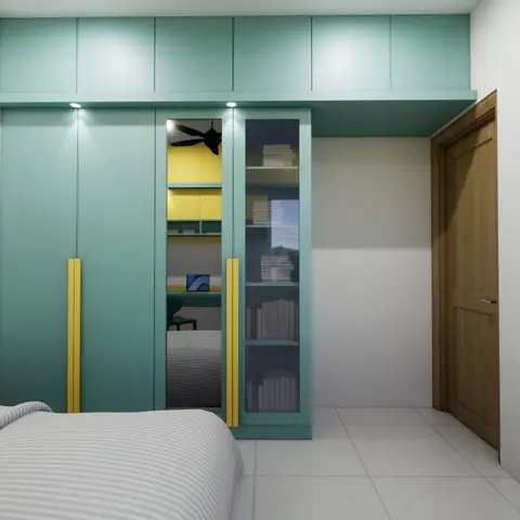 Bedroom wardrobe wall in sea-green matt shutters with slim yellow vertical handle profiles, a mirrored and glazed centre bay with yellow-backed book shelving