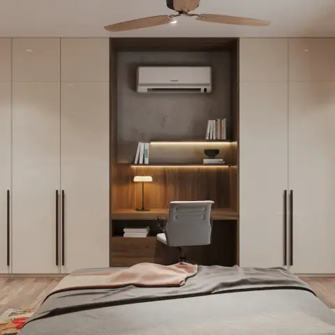 Bedroom wardrobe wall of cream gloss shutters wrapping a recessed walnut study niche with LED-lit shelves, a small brass desk lamp and a grey task chair