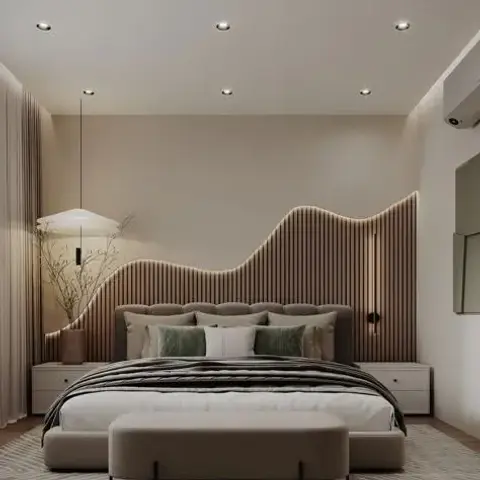 Bedroom where the fluted wood headboard wall is cut to a wave along its top edge with an LED strip tracing the curve