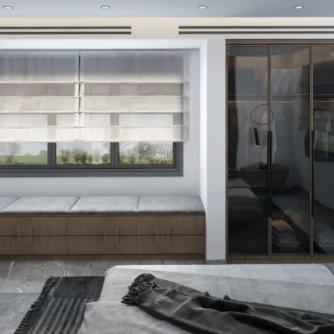 Bedroom with a built-in window seat storage bench, smoked-glass wardrobe doors opening to a walk-in closet, and open bookshelves beside sheer roman blinds.