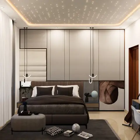 Bedroom with a fibre-optic star-effect cove ceiling above an upholstered panelled headboard wall, with a study desk nook to the side.