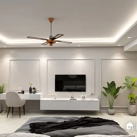 Bedroom with a floating fluted-front TV console flanked by moulded wall panels, a built-in study desk, and cove ceiling lighting.
