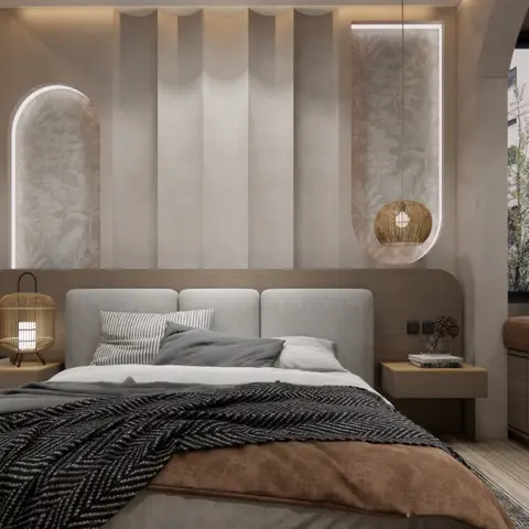 Bedroom with a fluted fabric-panel headboard wall and arched botanical-wallpaper niches, a rattan pendant and cage table lamp