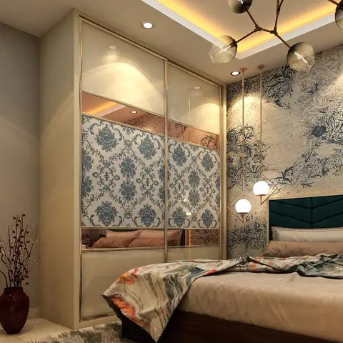 Bedroom with a mirrored sliding-door wardrobe featuring blue damask wallpaper insets