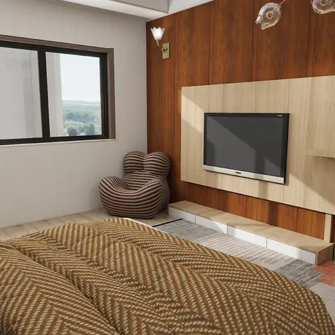 Bedroom with a mustard herringbone-quilted bed facing a wood-panelled TV wall with a floating media unit and a striped pouf-style chair in the corner.