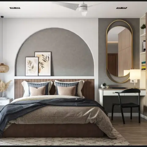 Bedroom with an arched grey-textured headboard wall, a rattan pendant light, dried pampas grass styling