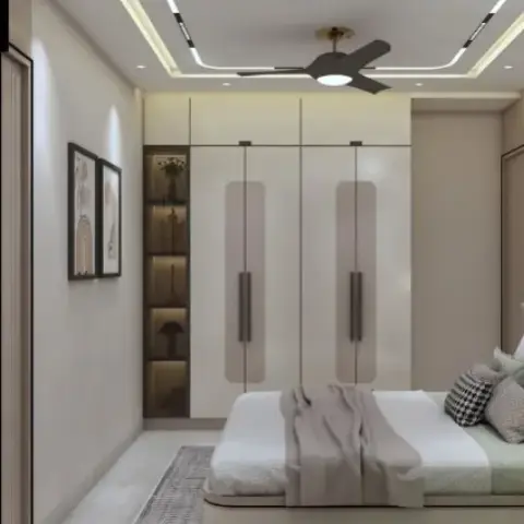 Beige four-shutter wardrobe with long bronze pull bars beside a column of backlit display niches