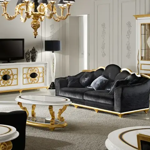 Black-and-gold baroque living set: black velvet sofa and armchairs with gilded scrollwork frames, a white lacquer TV sideboard with gold filigree doors
