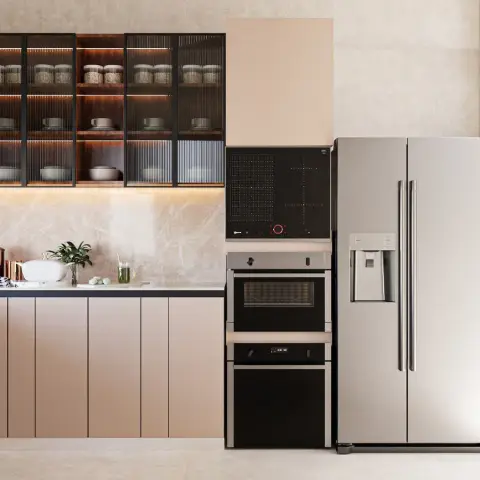 Blush handleless base run under black-framed reeded-glass wall units lit from inside, beige marble backsplash and a slim black counter