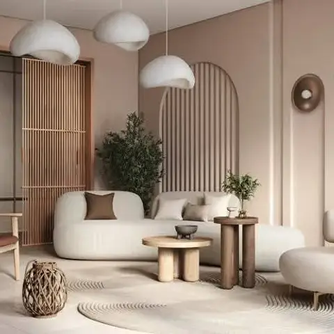 Blush lounge with a fluted arch backdrop and wooden slat screens, a rounded boucle sofa and two bulbous plaster pendants over a circular carved rug.
