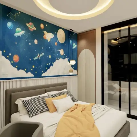 Child's bedroom with a planets-and-rocket space mural above a fluted white dado, a mustard throw across the grey upholstered bed