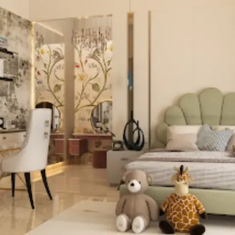 Child's bedroom with a scalloped sage upholstered headboard against cream panelling, a teddy and a giraffe soft toy at the foot of the bed