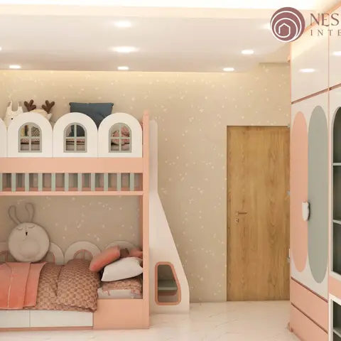 Children's bedroom with a peach-and-white playhouse-style bunk bed complete with a slide, star-pattern wallpaper, and a color-blocked wardrobe.