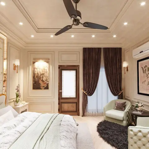 Classic bedroom with a gold-trimmed upholstered headboard, floral wallpaper accent panel, moulded wall panelling, brown velvet drapes